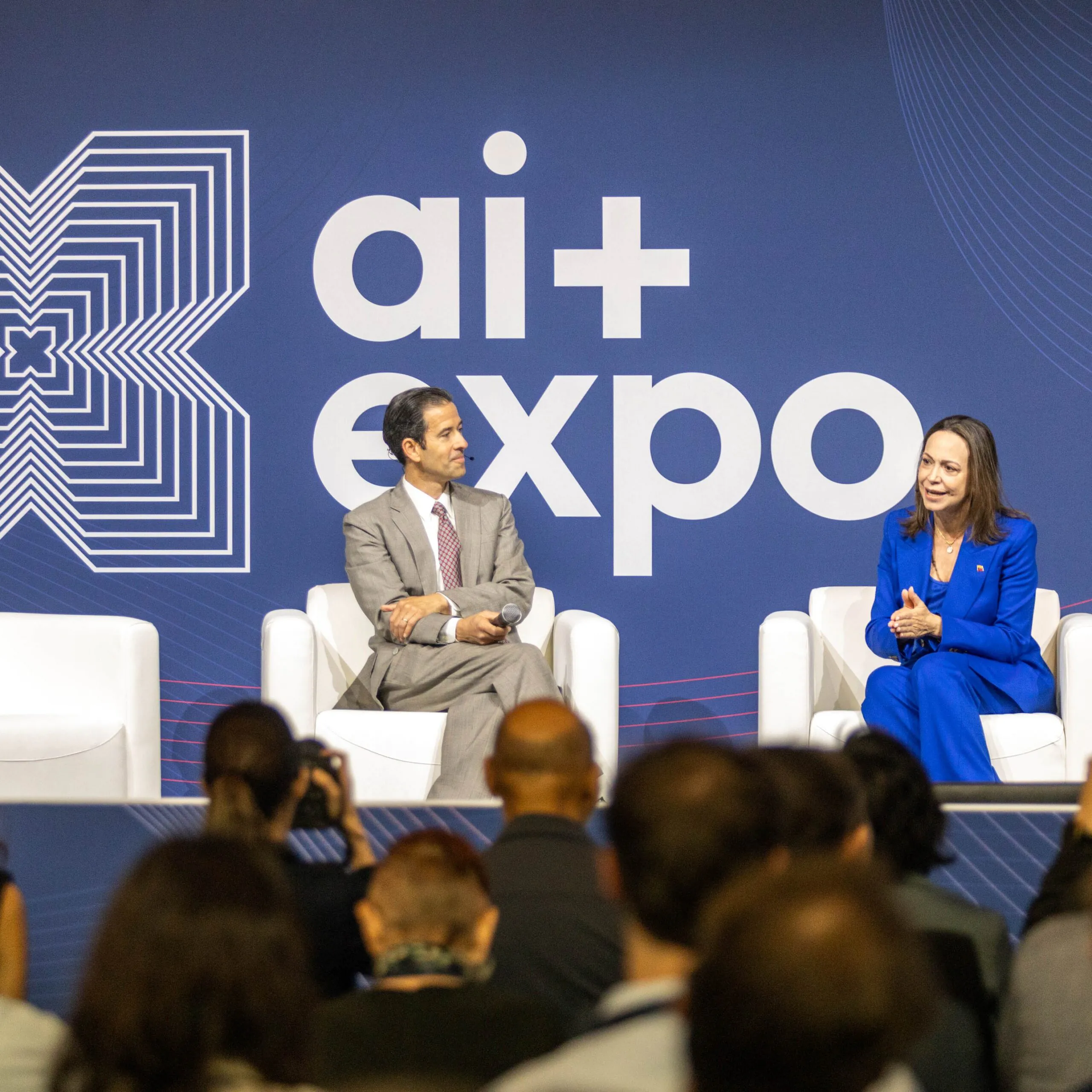 AI+ Expo 2026 panel session with audience