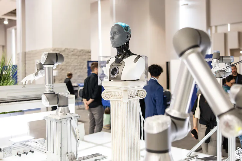 Humanoid robot and robotic arms at ai+expo 2026